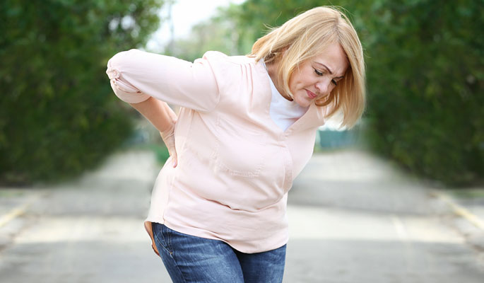 Women Suffering from Acute Back Pain
