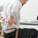 Person Dealing with Serious Back Pain
